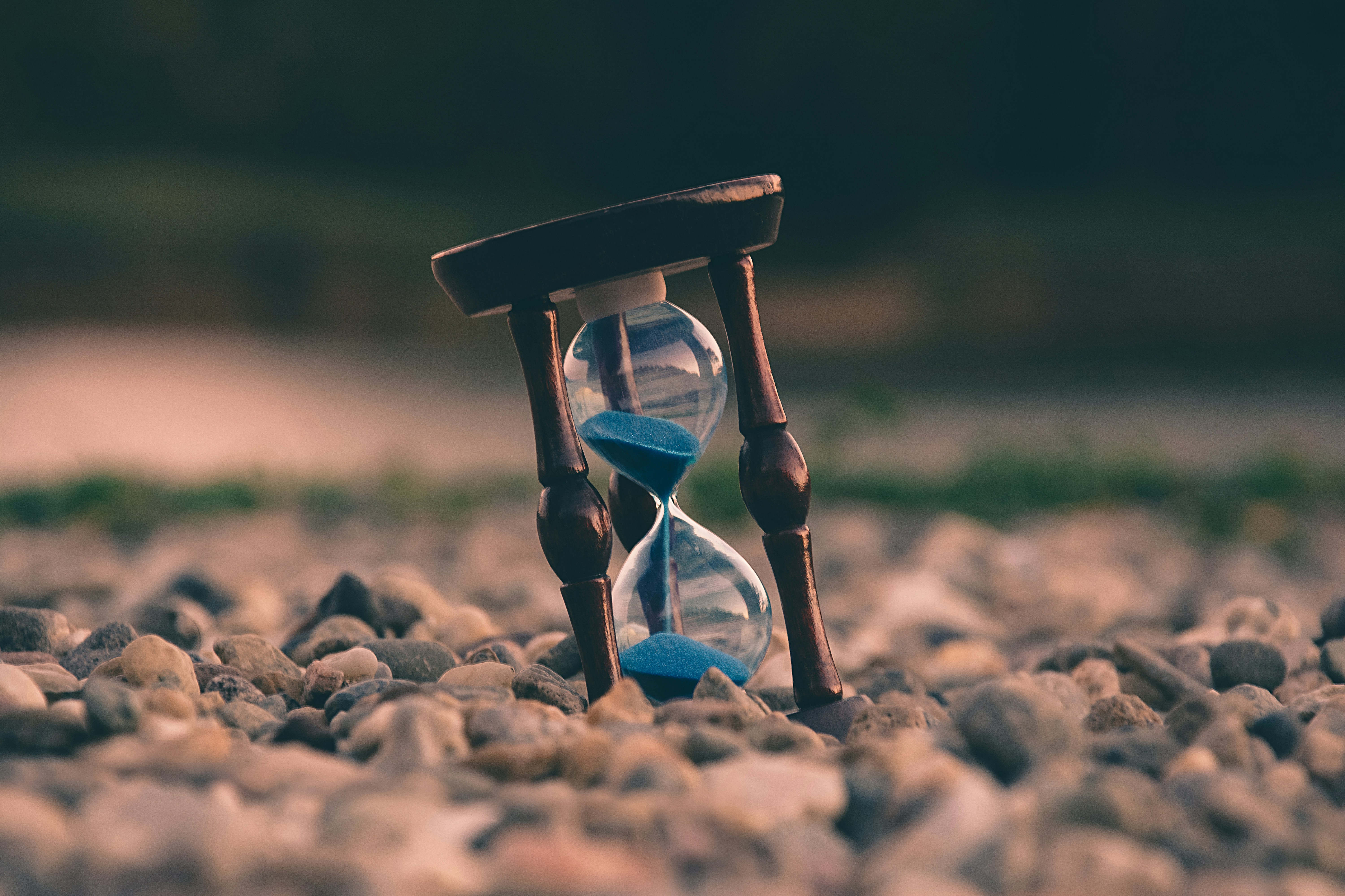 Picture of a clock with sand pouring down